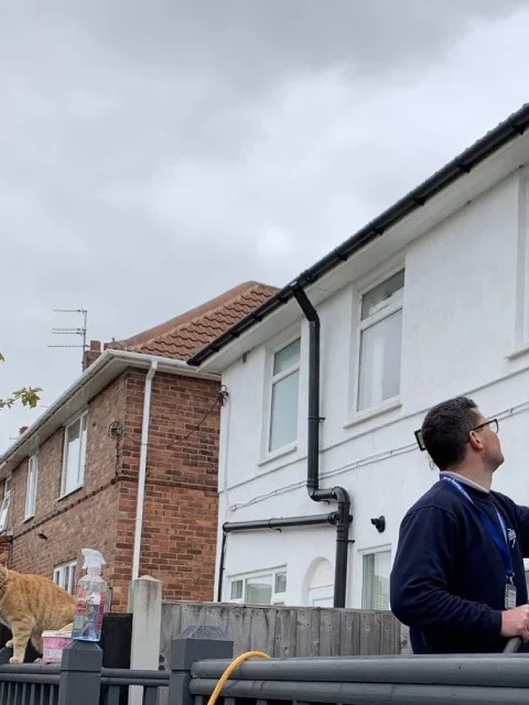 Tom out on the water-fed pole for Eden Window Cleaning
